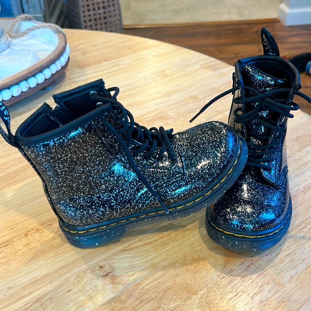 Like new Dr. Marten black patent leather silver glitter boot and sole size 10